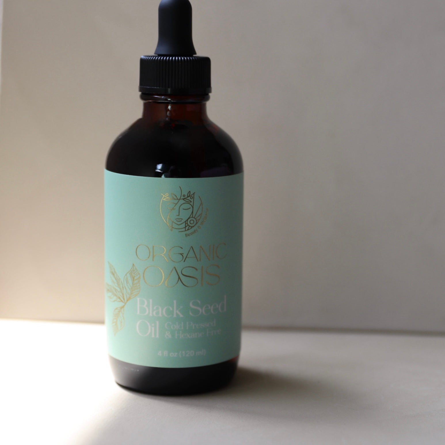Black seed oil for skin in amber dropper bottle