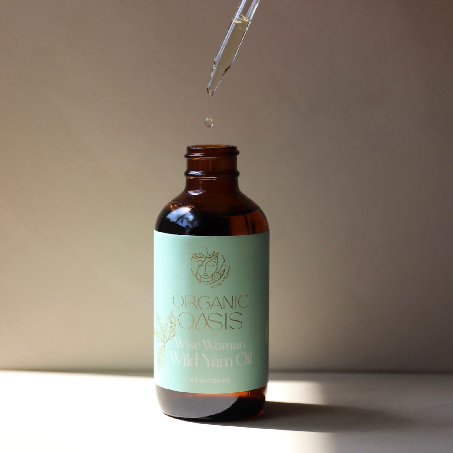 Wild yam botanical body oil in amber glass bottle