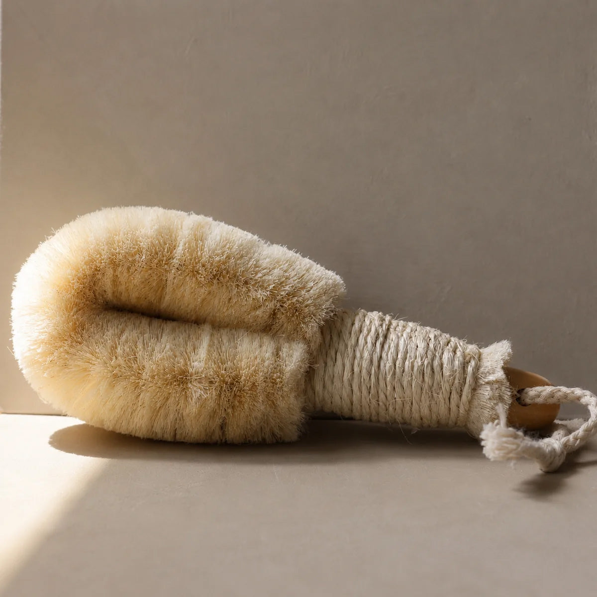 Exfoliating body brush for at-home body care