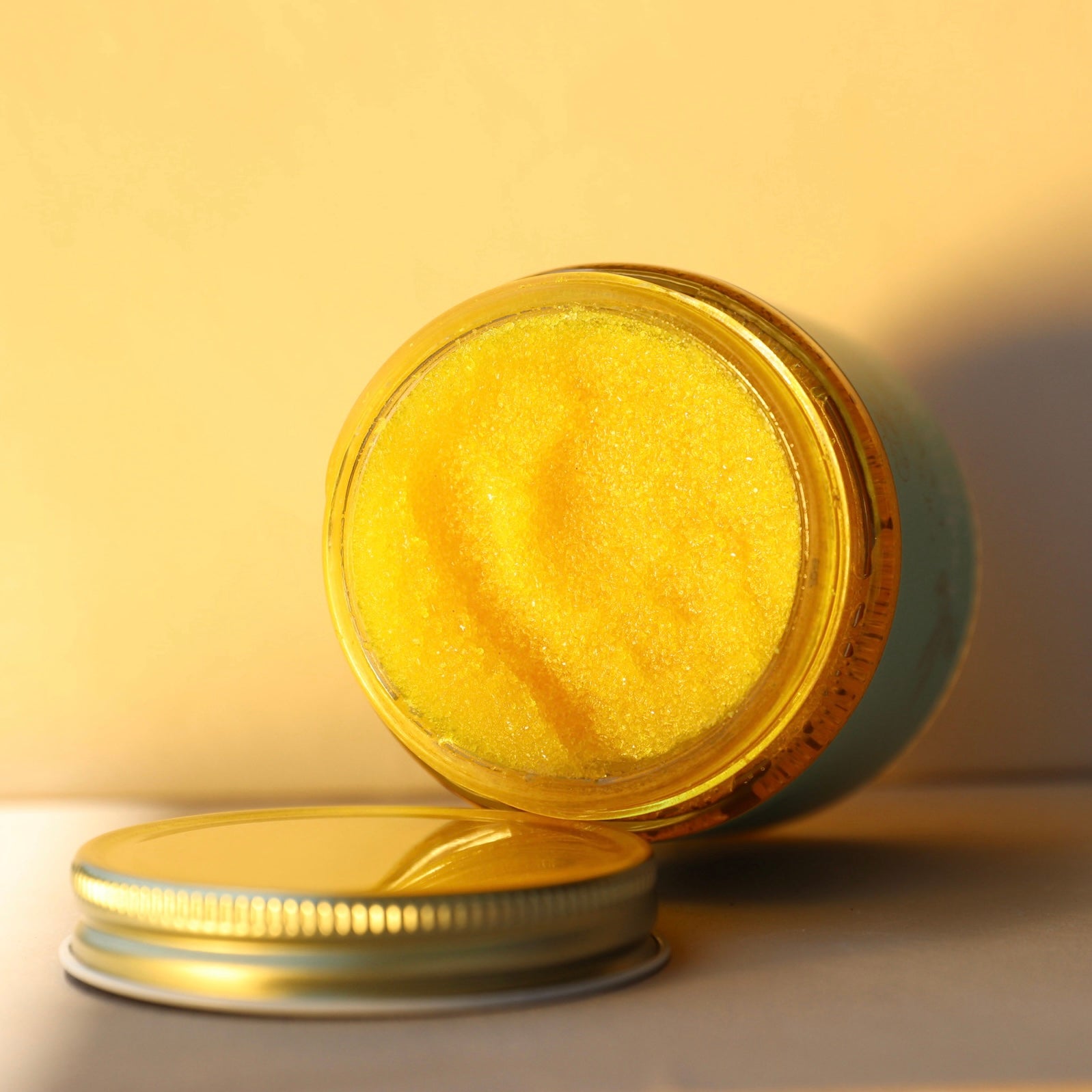 Mineral salt body scrub with turmeric and manuka honey