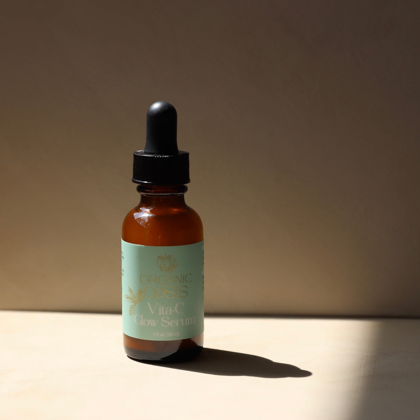 Vitamin C Glow Serum bottle by Organic Oasis