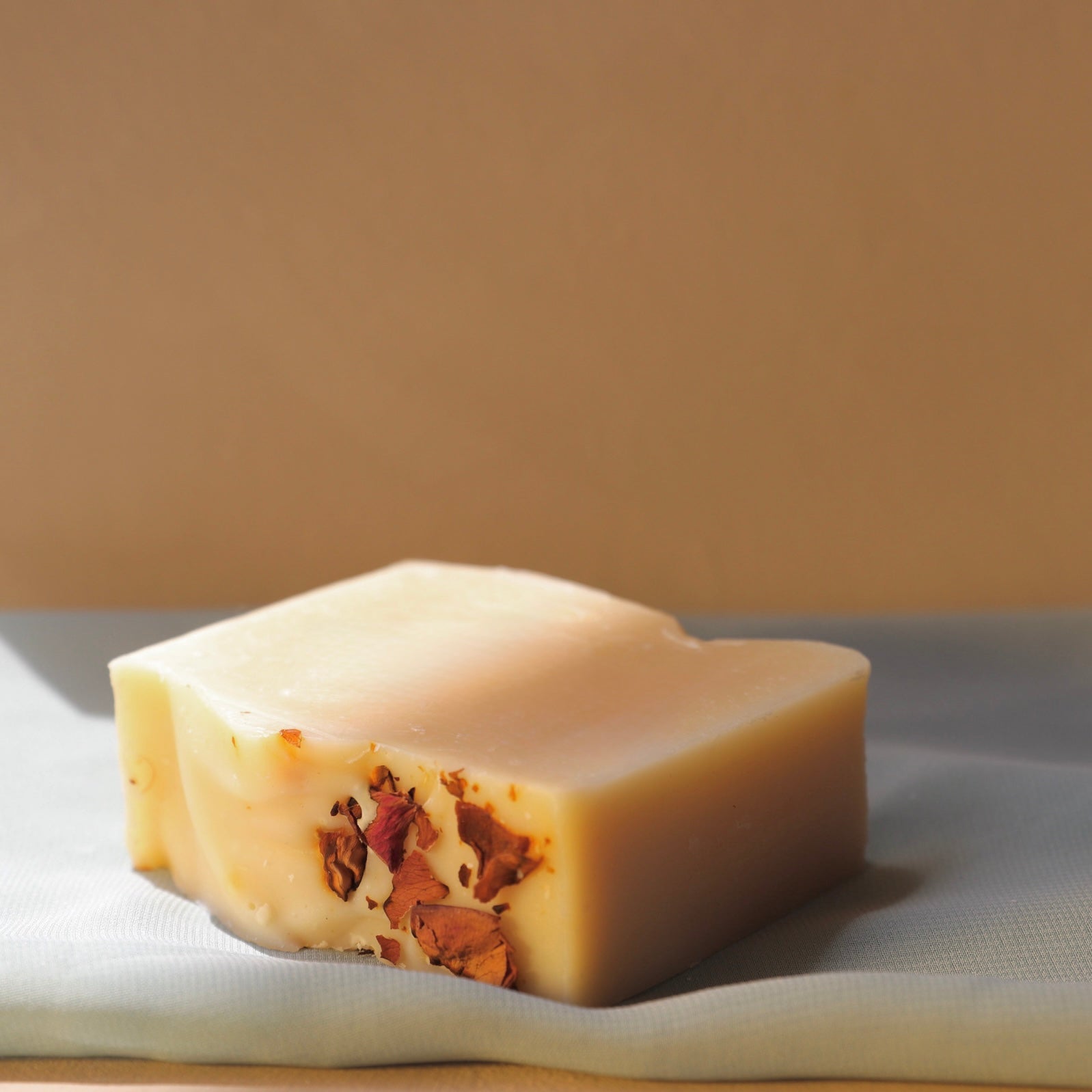 Gentle probiotic botanical soap bar with dried botanicals
