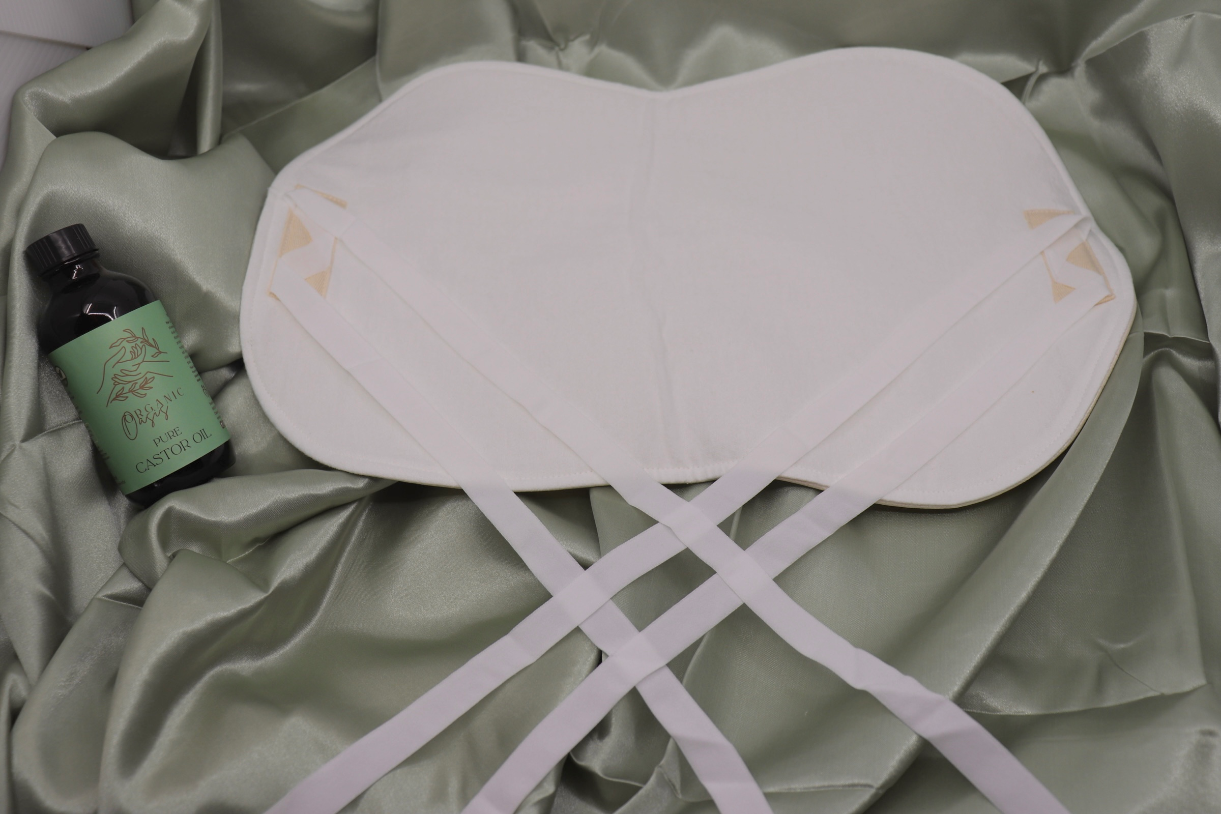 Soft adjustable castor oil abdominal wrap
