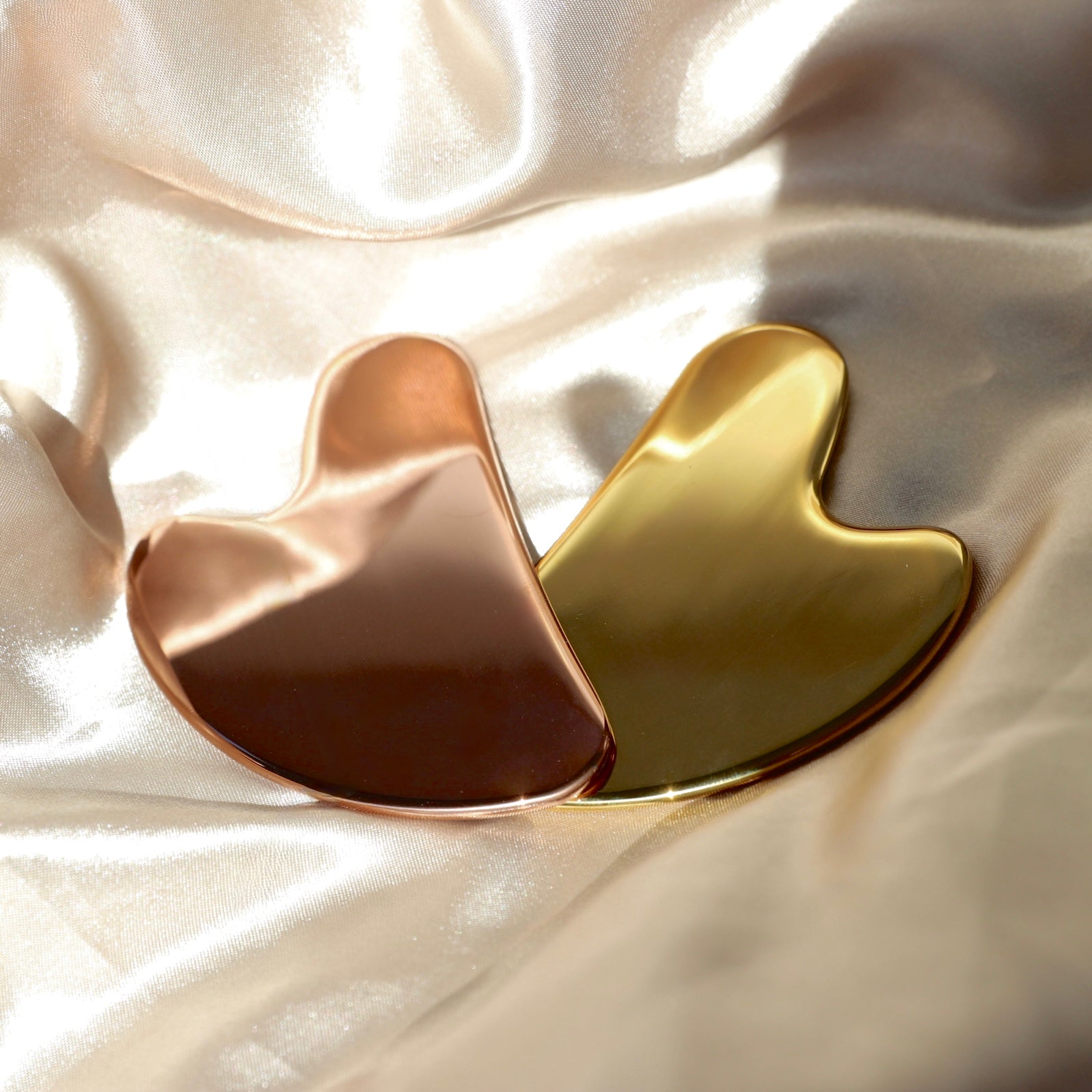 Rose gold stainless steel gua sha facial massage tool
