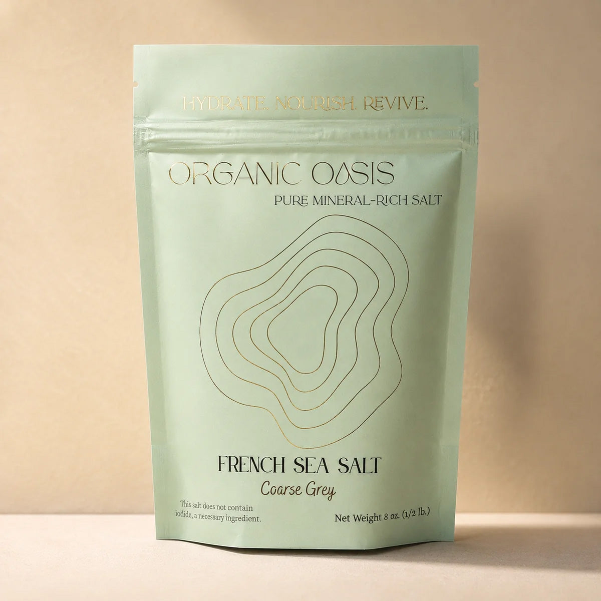Package of Organic Oasis French Sea Salt on a beige background