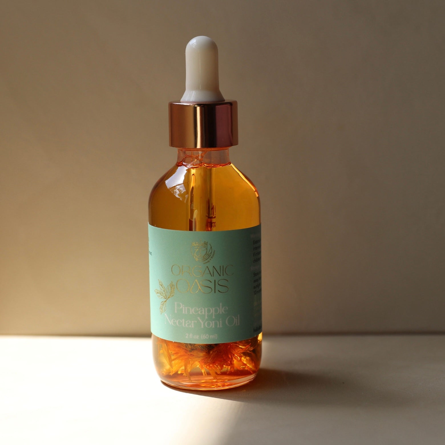 Pineapple Intimate Oil bottle by Organic Oasis
